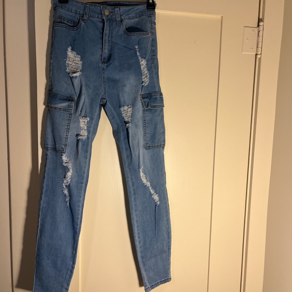 High waisted ripped blue jeans